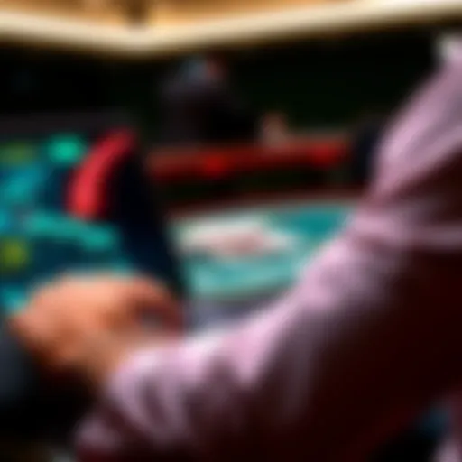 A person enjoying an online blackjack game on a laptop with chips and cards in view