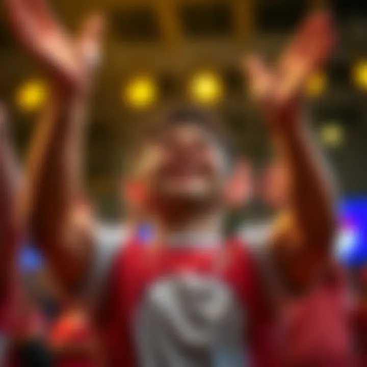 A person smiling and raising their hands in celebration, symbolizing a personal achievement.