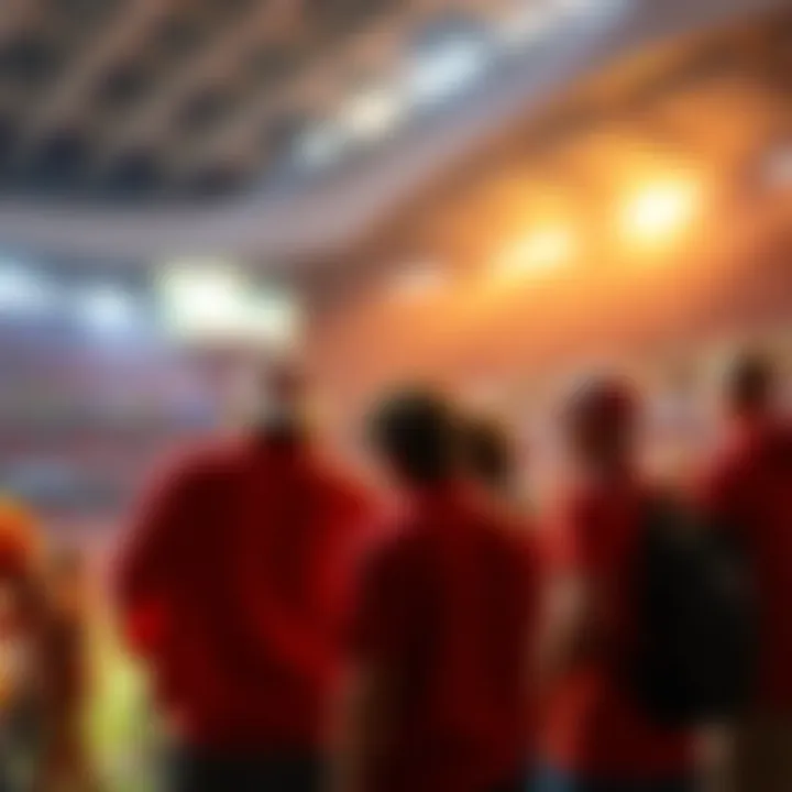 Group of football fans sharing their thoughts on the best plays of the CFB 2026 season in a stadium setting