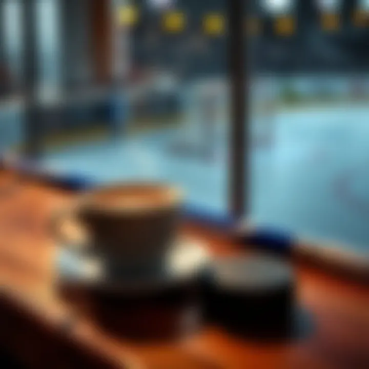 A steaming cup of coffee next to a hockey stick and puck on a wooden table, symbolizing a perfect morning routine.