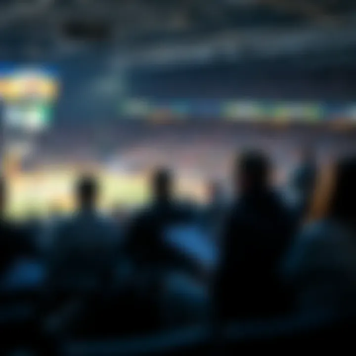 A group of people watching a college sports game, taking notes and discussing betting strategies for the first half.