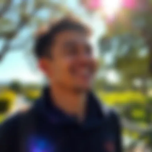 Eddie with a bright smile in a sunny park, showing positivity amidst challenges