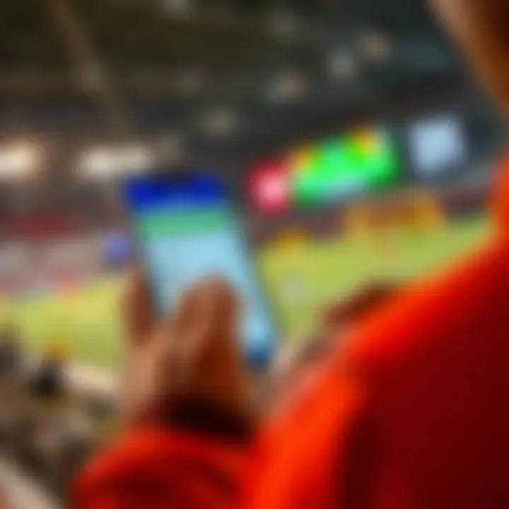 A person placing a bet on a mobile device with sports graphics in the background