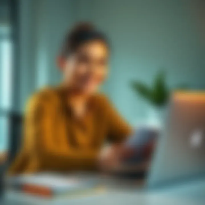 A person smiling while working at a desk with a planner and a laptop