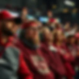 NC State fans reacting to loss Frustrated NC State fans in team gear showing disappointment after a recent game loss