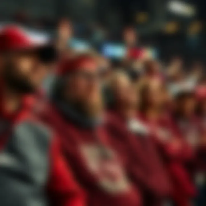 NC State fans reacting to loss Frustrated NC State fans in team gear showing disappointment after a recent game loss