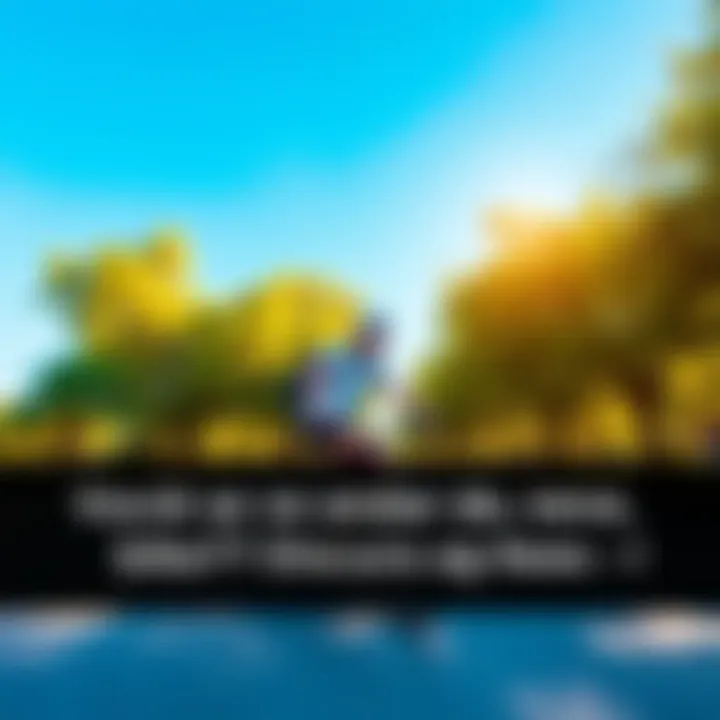 A person cycling in a park with green trees and a clear blue sky