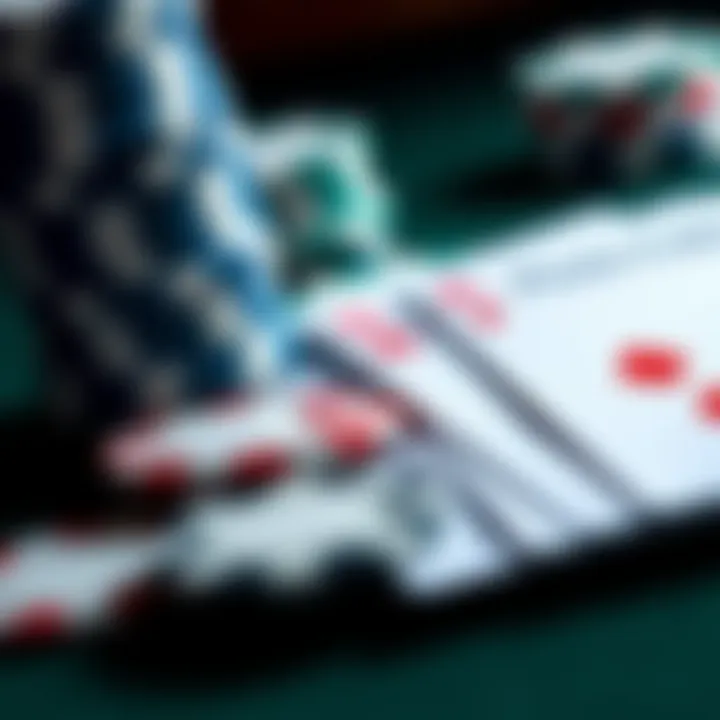 A close-up of poker chips and playing cards on a table, illustrating a poker game scenario.