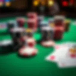 Close-up of poker chips and playing cards on a green table, representing a micro stakes poker game session.