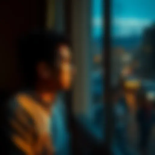 A person sitting alone by a window, looking sad with a thoughtful expression, reflecting feelings of discouragement.