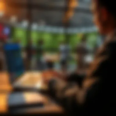 A person studying sports odds and making betting choices with a laptop and notepad in front of them.