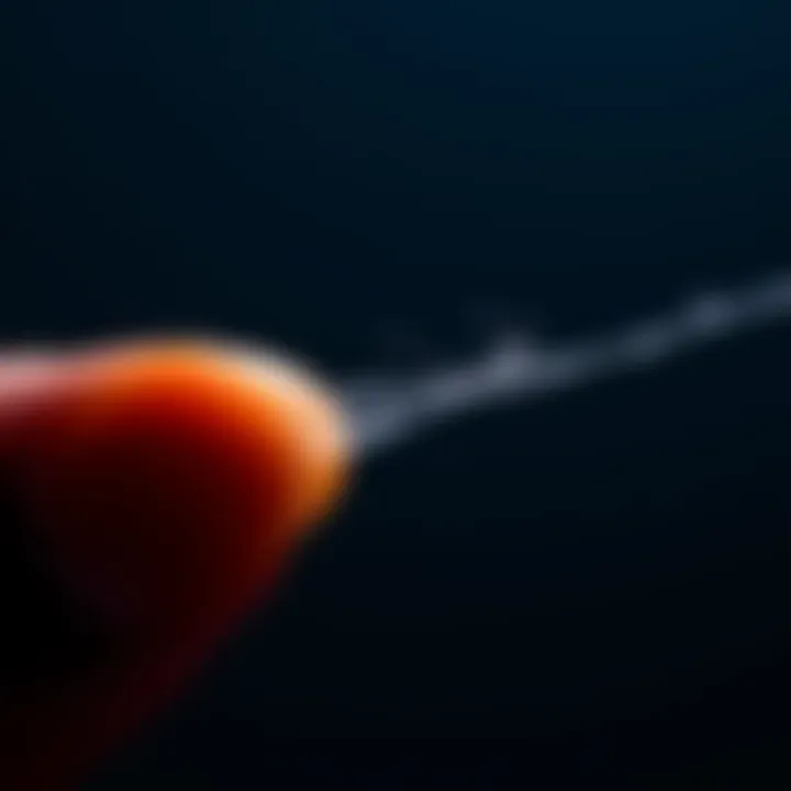 A close-up of a delicate, thin material being held carefully, showing its fragility and potential risk.